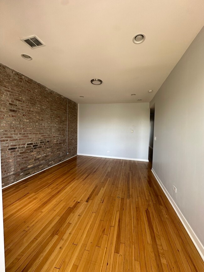 Living room area 1 - 3626 W Polk St Unit 3