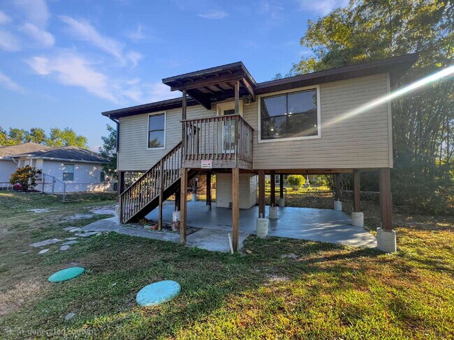 Photo - Cozy Inside, Spacious Outside: Fort Myers 2 Bed / 1 Bath + Giant Lawn + W/D Hookups — Pets Accepted
