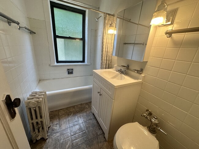 2228-38 Sherman Ave. / 803-809 Noyes St.