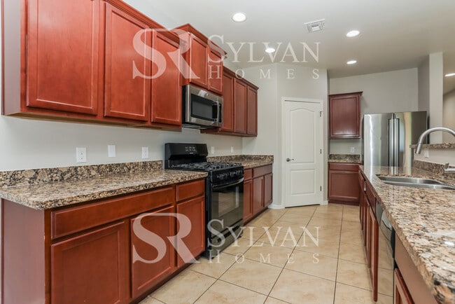 Photo - The living is easy in this 5 bedroom, 3 ba...