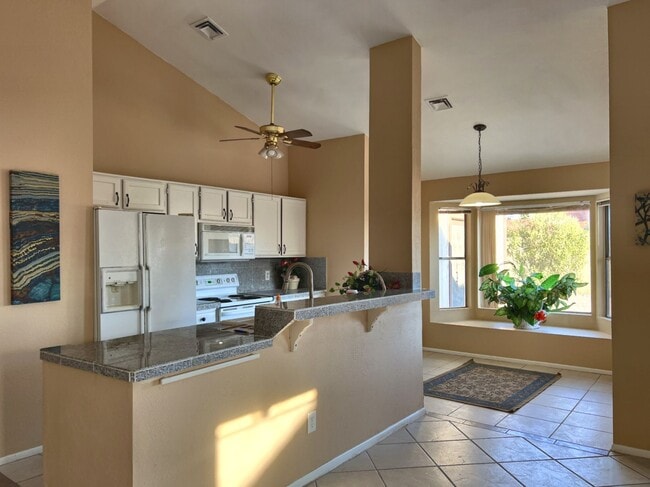Photo - LARGE REMODELED 4BR 2BA HOUSE WITH GARAGE, GRANITE COUNTERS, BUILT-IN BREAKFAST BAR, TILE FLOORS
