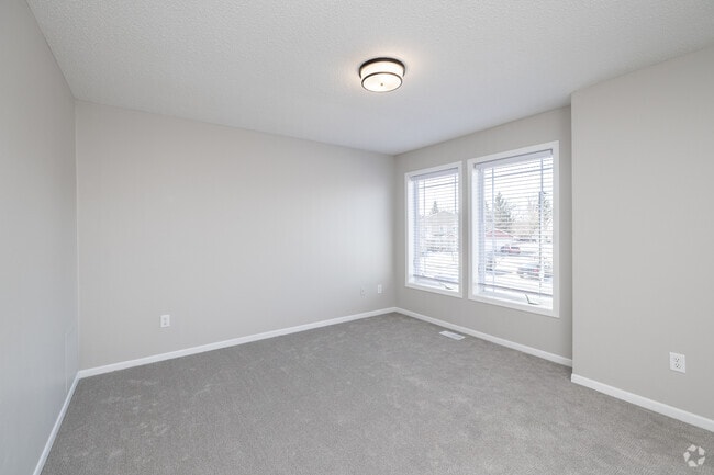 3BR, 2BA - 1,300SF - Primary Bedroom