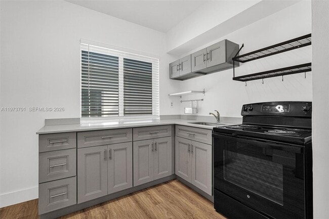 Building Photo - 319 80th St Unit 8