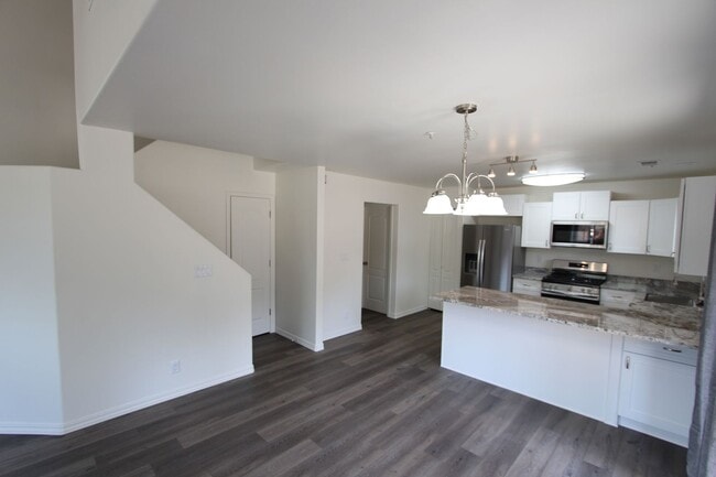 Building Photo - Remodeled End-Unit Townhome in Village at Elk Run | 3BR + 2-Car Garage