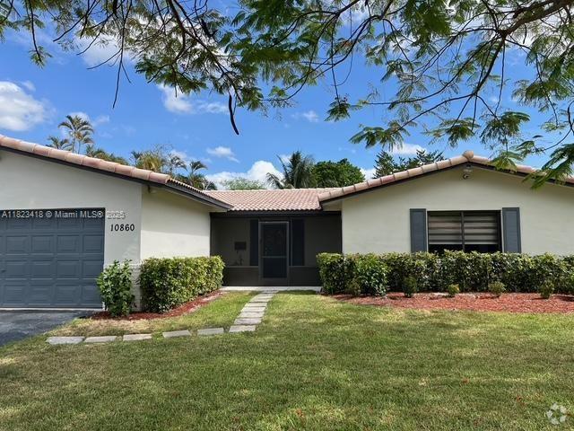Building Photo - 10860 NW 40th St Rental