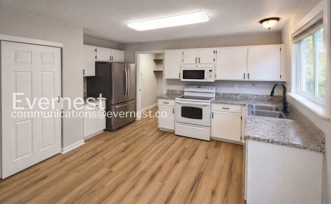 Photo - 3 Bed, 4 Bath Home with Fenced Yard & Garage / Pet-Friendly / Available Soon!
