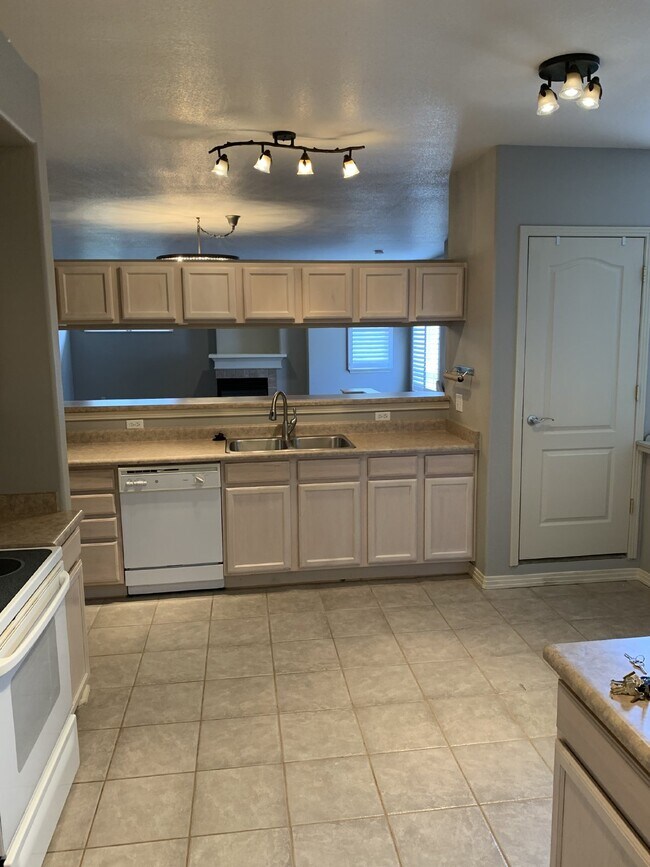 Photo - Modern Executive Condo – 2 Bedrooms | 2 Bathrooms | Attached 2-Car Garage Unit E