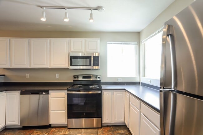 Photo - 4 WEEKS FREE RENT! PLUS FREE iPad or 55” TV IF MOVED IN BY 6/30! Charming 3bd/2ba Single-Level Ho...