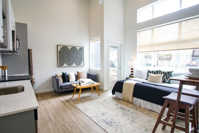 Building Photo - Sleek & Modern Studio w/Condo-Grade Finishes + Patio! Unit 105