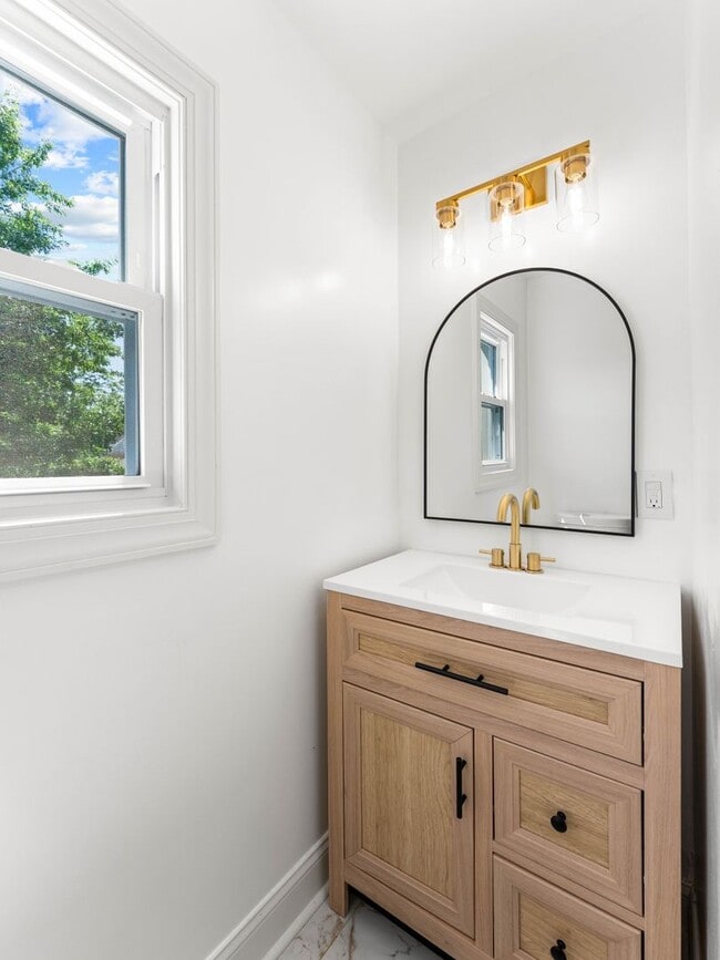 Photo - Beautifully Renovated 4-Bedroom Home with Designer Kitchen, Updated Bath & Central Air – Availabl...