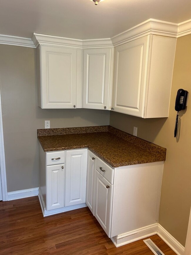 Photo - Modern Charm: 2 BR Home with Finished Basement, Pet Friendly, Assigned Parking, and Prime Location!