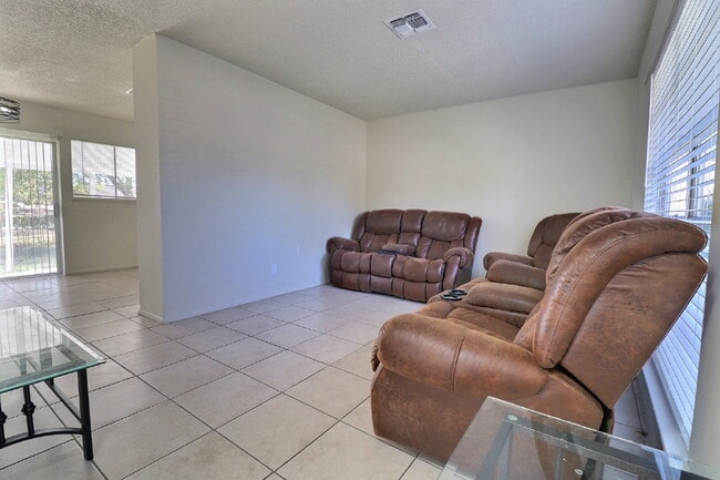 Photo - Cozy 3-Bed Home with Eat-In Kitchen & Covered Patio in Converse.