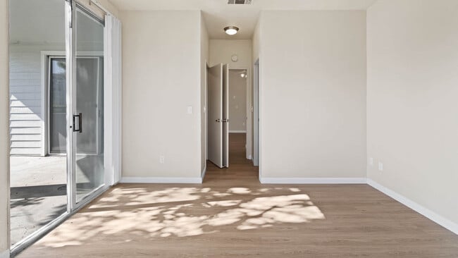 Bedroom with Hard Surface Flooring - Schooner Bay Apartment Homes