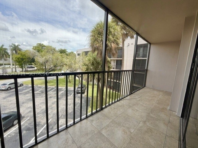 Building Photo - 8700 SW 133rd Ave Unit 302