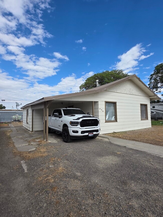 Attached carport big enough for tall 1ton pickup, parking on side - 552 5th Ave W