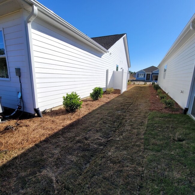 Photo - Brand New 4 bedroom, 2 bathroom house located in the desirable Brunswick Forest community in Leland