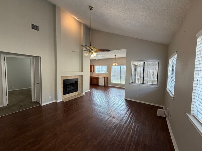 Photo - NICE 3 BR IN NEISD W/ WOOD VINYL COMPOSITION FLOORING*HIGH CEILINGS*FIREPLACE IN LIVING ROOM MAKE...