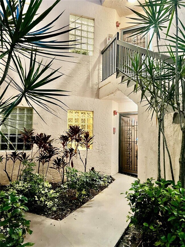 Building Photo - 10730 NW 14th St Unit 160 Rental