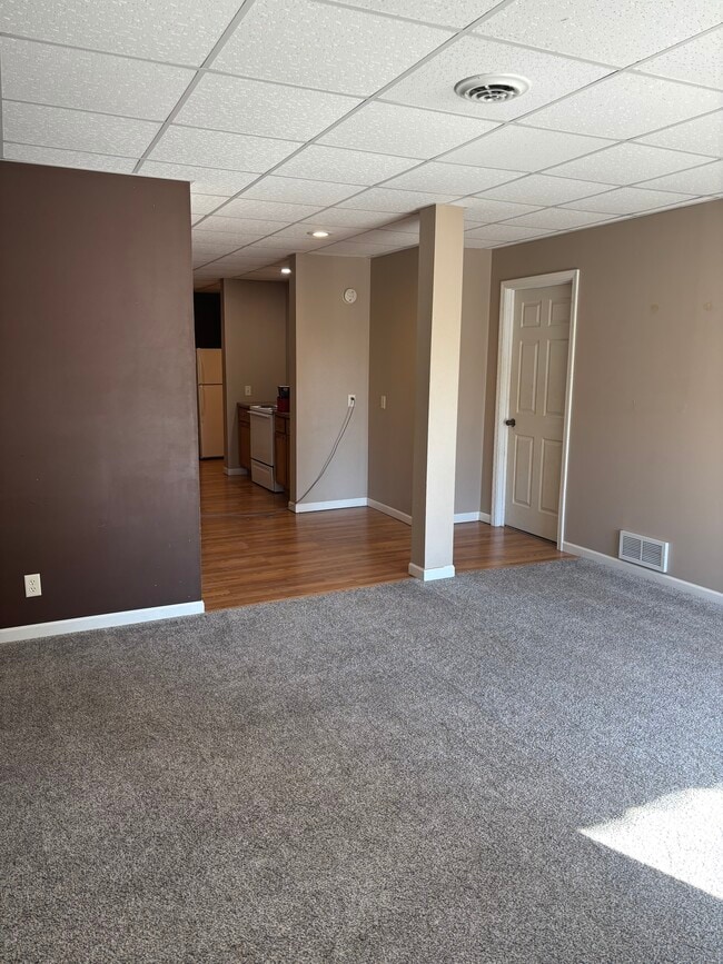 Livingroom looking to Kitchen & Bedroom 1 door - 211 E Franklin Street Unit Lower Apartment