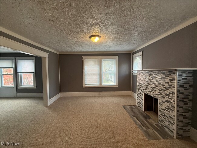 Building Photo - 7608 Lawnview Ave Unit 2