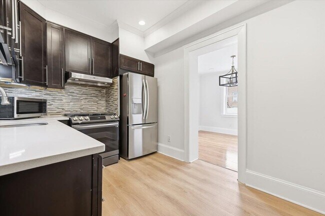 Photo - 6033 Monitor Pl Unit 2