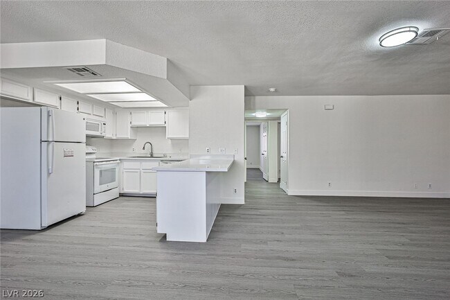 Building Photo - 7957 Lions Rock Way Unit 201