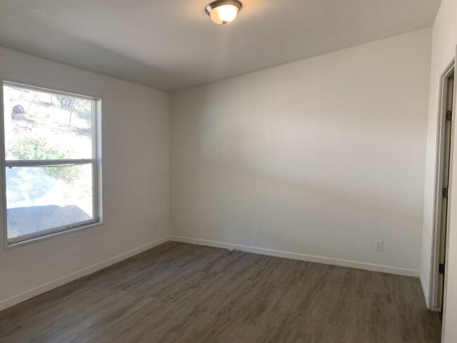 Photo - Enjoy country living with views in this 3-bedroom, 2-bath home.