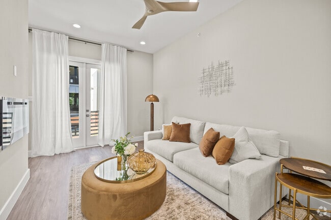 2BR, 2.5BA - 1,200SF - Living Room - The Merritt Condominiums
