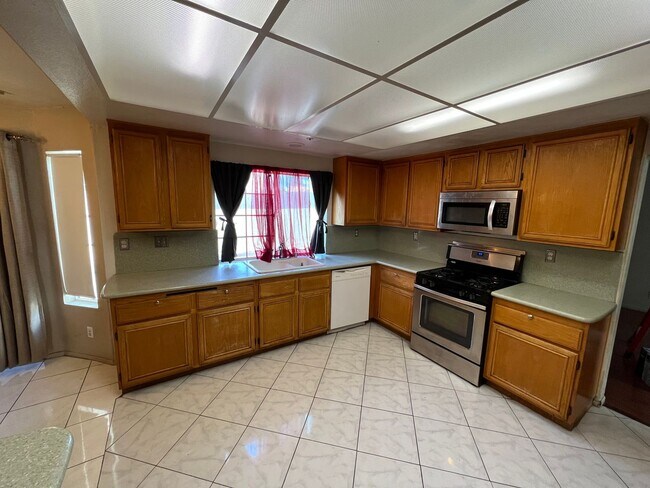 Photo - Spacious 4-Bedroom + Office Home in Desirable HOA Community Near New Shopping & Costco