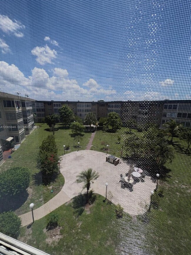 Building Photo - 3091 NW 46th Ave Unit 407C