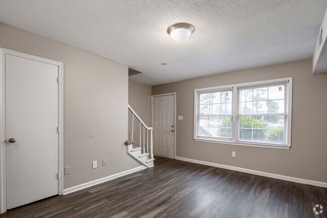 2BR, 1.5BA - 985SF - Living Room - Retreat at Broad River