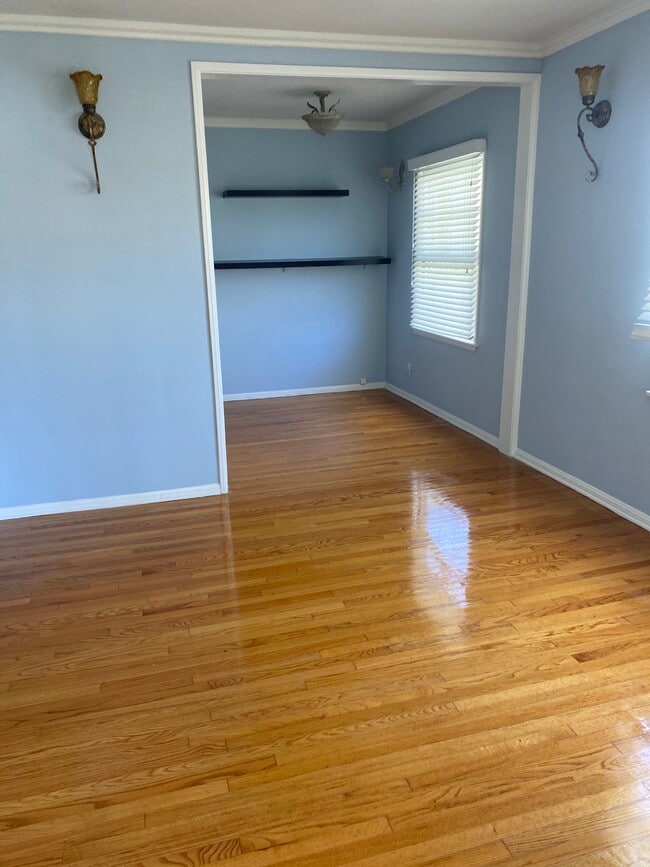 Beautiful hardwood floors! I will repaint in white or any light pastel color you decide - 1859 1/2 Pandora Ave Unit 1