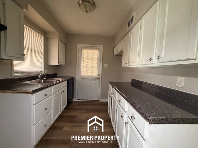 Photo - Charming 3BR Memphis Home with Tile Floors, Dining Area & Fenced Backyard