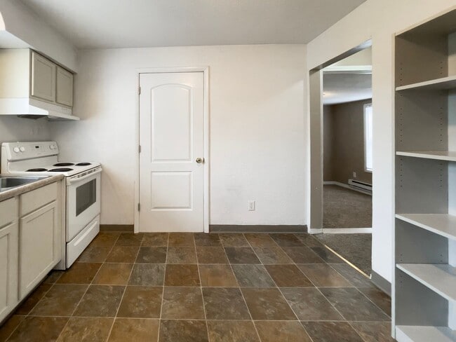 Photo - PRELEASING for AUGUST! Walk to Ball State! Bright 4BR Home with Fireplace