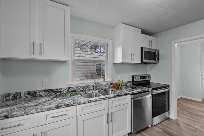 Photo - NEW RENTAL ALERT: Beautiful 4-Bed Home in Hampton — Available NOW!