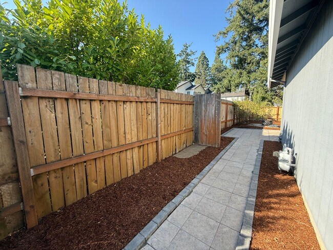 Photo - Spacious 3BD/2BA Home with Two-Car Garage,...