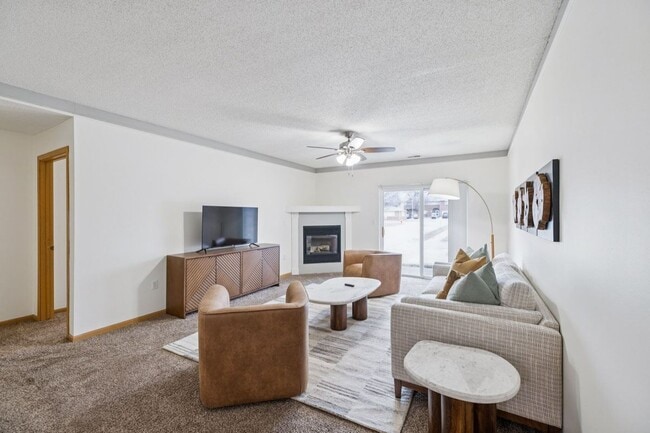 Our spacious living rooms are perfect for relaxing by the cozy fireplace, creating a warm and inviting space for everyday living.