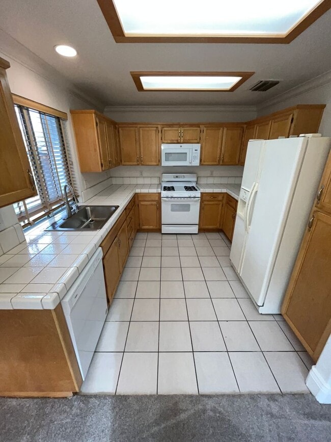 Photo - Gated 3BR|2.5BA|1508SF|2 Car Garage| Tenant pays $175 for WS&G | Community Pool, Clubhouse, & Fis...