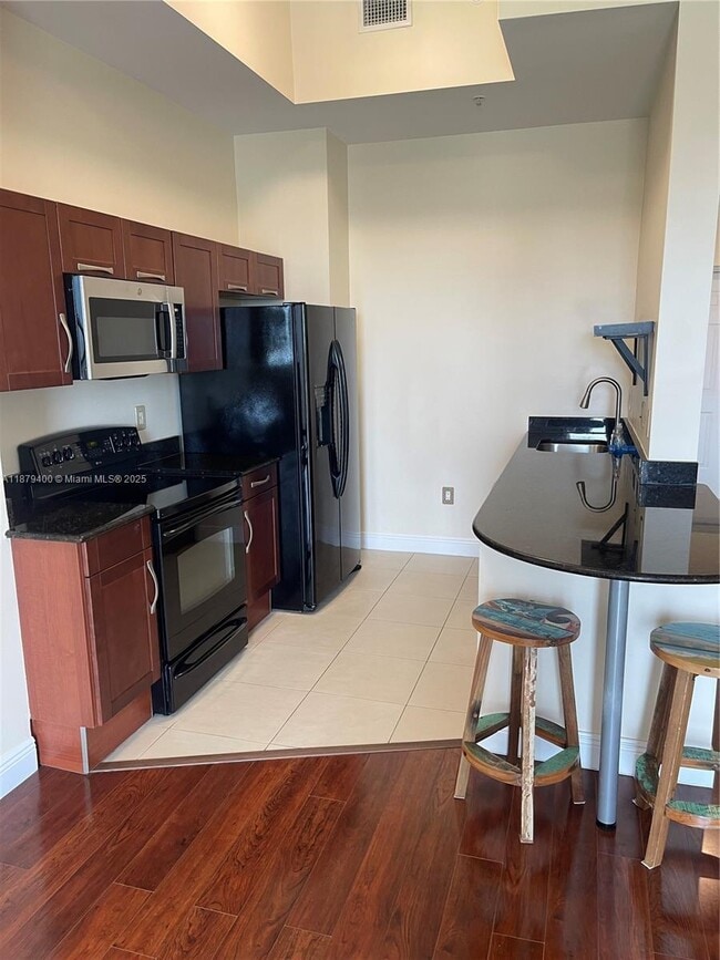 Building Photo - 7280 SW 90th St Unit 708 Rental
