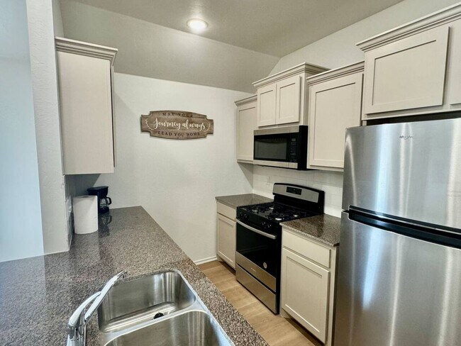 Photo - New Modern 2BR/2BA Duplex | Fully Furnished | Pet-Friendly