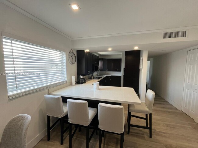 Photo - 6965 Harding Ave Unit 401