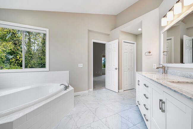 Photo - Spacious 5 Bedroom 3 Bath Home w/ 3-Car Garage and New Updates!