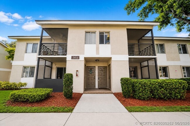 Building Photo - 503 Gardens Dr Unit 202