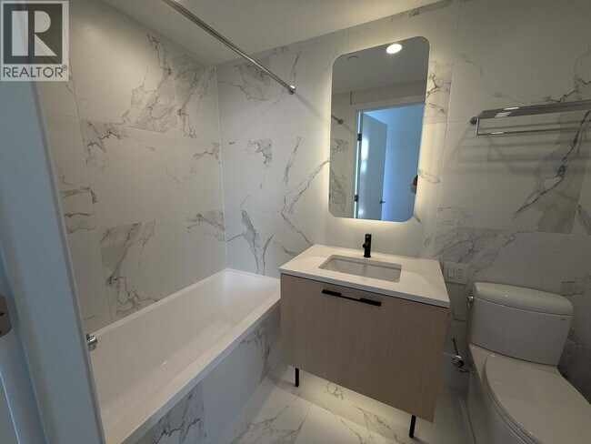 Photo - 2729 Kingsway Unité 5XX