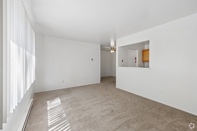 2BR, 1BA - 920SF - Living Room - Woodcreek Apartments