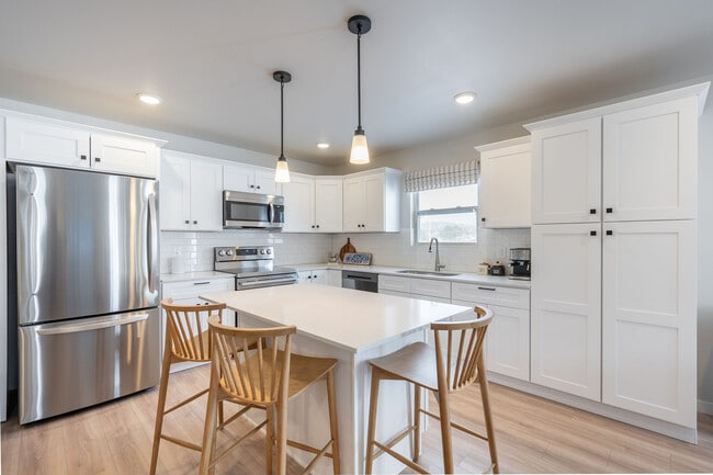 A stylish apartment kitchen ready for weekday dinners, weekend brunches, and late-night snacks.