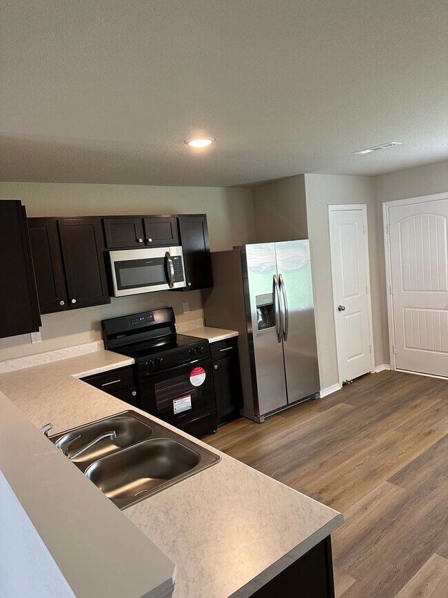 Photo - Pre-Leasing Now! Discover Spacious Living in This 4-Bedroom, 2-Bath Cabot Home