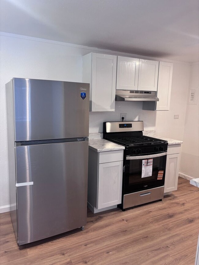 Photo - 700 W 45th Ave Unit B