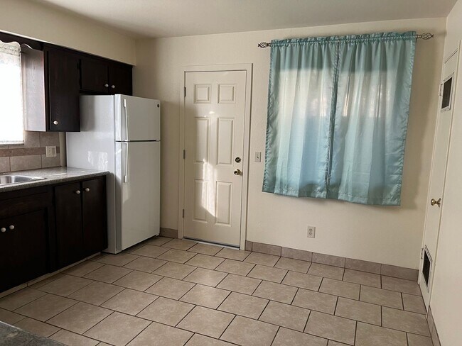 Photo - University Triplex Unit University #A-874