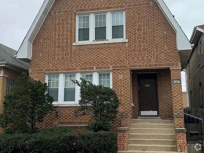 Building Photo - 5207 W School St Unit BSMNT Rental